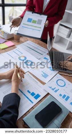 Financial analyst analyzes businessman investment consultant analyzing company financial report balance sheet statement working with documents graphs. Concept picture for stock market, office, tax