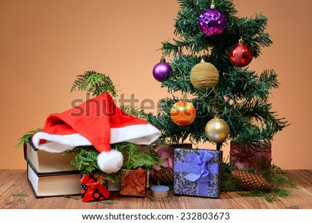 Christmas presents under a pine tree