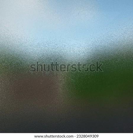 Glass solid embossed background from white, green to black.