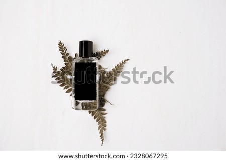 perfume bottle mockup with white textured background.