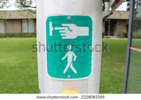 Road signs, traffic lights and light poles