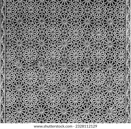 Geometric traditional Islamic ornament. Fragment of a ceramic mosaic.Abstract background. Black and white.