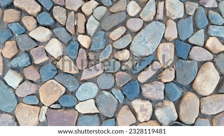 Stone texture for the background. Multicolored stone pavement