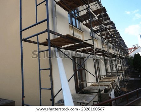 scaffolding near the building wall during restoration