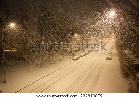 a lot of snowfall and empty road Royalty-Free Stock Photo #232819879