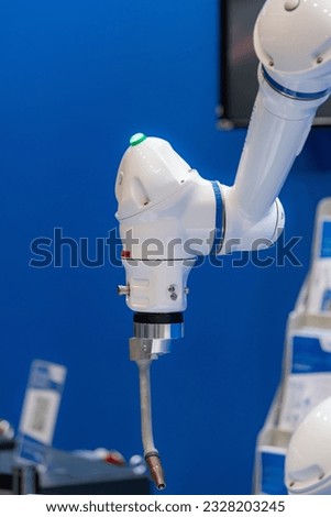 Industrial robot enhancing efficiency in manufacturing processes with precise automation