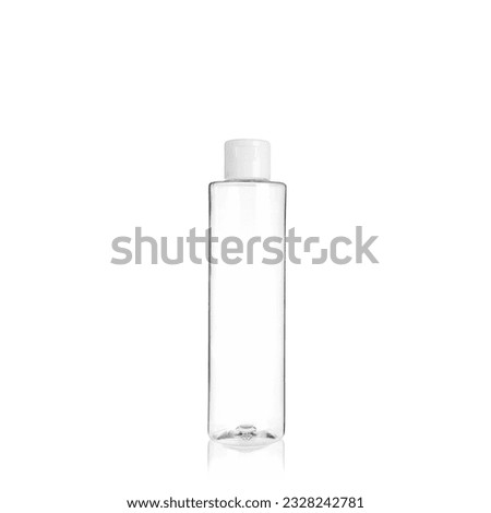 Transparent cylindrical PET bottle container with white cap. Packaging of antiseptic. Template of a bottle for cosmetics and medical products. Isolated on white background, copy space template. Royalty-Free Stock Photo #2328242781