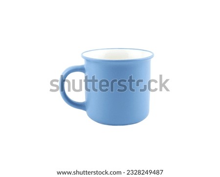 Empty blue mug for coffee or tea isolated on white background. Use for home or restaurant, food design. Concept kitchen utensils and tableware.
