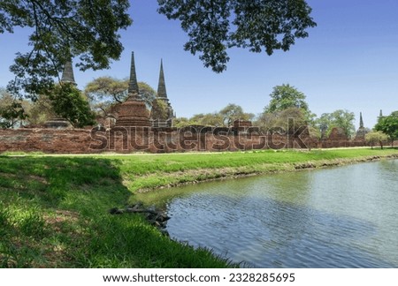 Ruins of buddha statues and pagoda of Wat Phra Si Sanphet temple in Ayutthaya historical park, Thailand