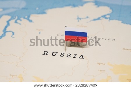 The Flag of Russia on the World Map. Royalty-Free Stock Photo #2328289409