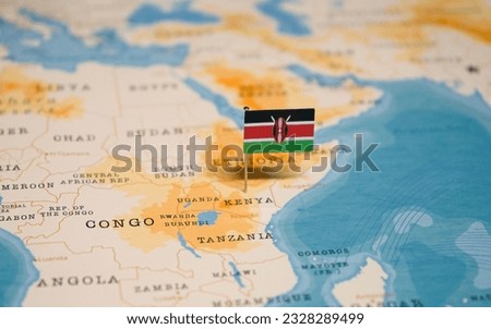 The Flag of Kenya on the World Map. Royalty-Free Stock Photo #2328289499