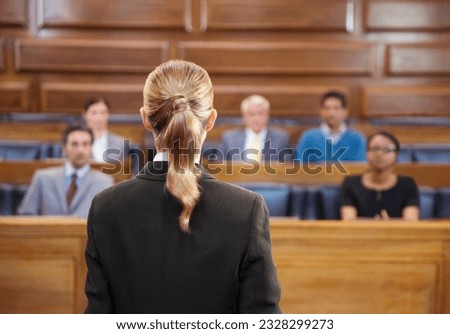 Lawyer pleading case to jury in court Royalty-Free Stock Photo #2328299273