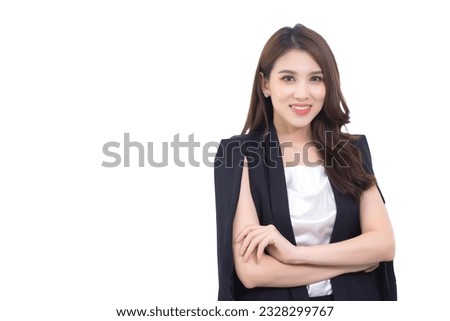 Professional young Asian Business woman who wears black suit and cross arms stands confident while isolated on white background.