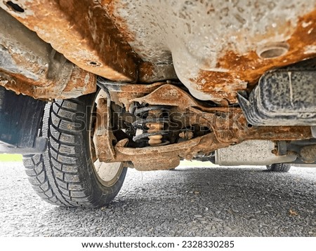 rusty underside of an old car Royalty-Free Stock Photo #2328330285