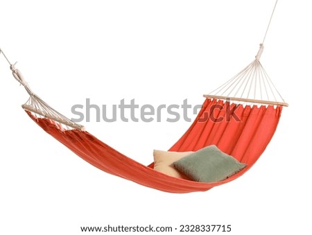 Cozy red hammock with cushions isolated on white background Royalty-Free Stock Photo #2328337715