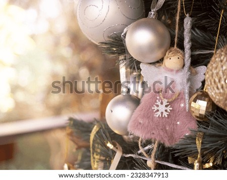 Angel character costume icon cartoon pink red color tree pine merry christmas happy new year xmas blue motion bokeh background wallpaper copy space christian beautiful valentine december winter fir 