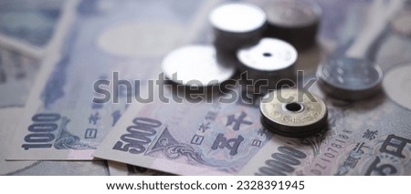 Japanese Yen money. close up of the Japanese yen on hand. currency of Japan that is used to change, buy, sell, accumulate, invest, financial, exchange rate, value, accounting, international exchange Royalty-Free Stock Photo #2328391945