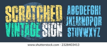 Scratched Vintage Sign Font. With an eroded and scratched texture for an authentic and weathered look. Royalty-Free Stock Photo #2328403413