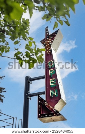 Vintage Arrow sign with Neon Open that lights up