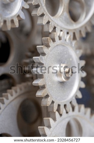 Close view of old clock mechanism with gears and cogs. Conceptual photo for your successful business design. Copy space included.