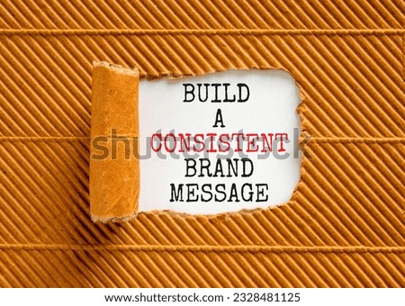 Consistent brand message symbol. Concept words build a consistent brand message on beautiful white paper. Beautiful brown background. Business consistent brand message concept. Copy space.