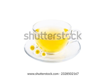 Chamomile herbal tea with flower buds and chamomile bouquet isolated on white background. Useful herbal, soothing drinks and natural healer concept. Immunity tea.Close up. Copy space. Royalty-Free Stock Photo #2328502167