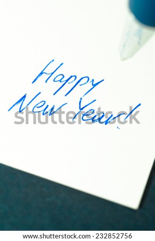 congratulation written by pen on paper