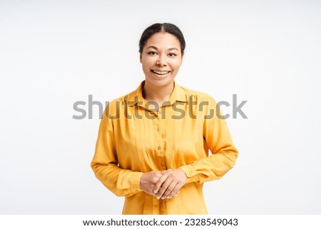Portrait of beautiful smiling African American woman looking at camera isolated on white background, copy space. Successful business, career concept