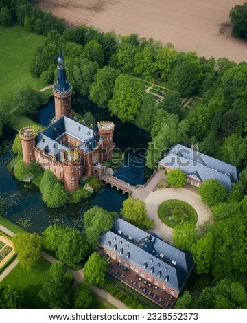 Aerial drone view medieval water castle Moyland fortress North Rhine-Westphalia, Germany