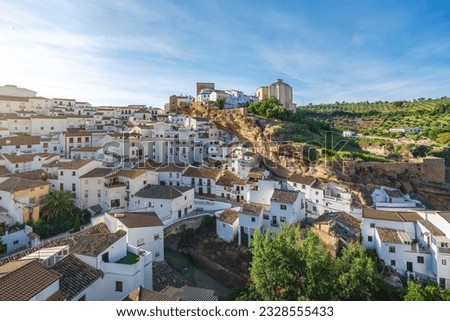 Aerial view of City with Rock Overhangs, Church of la Encarnacion and Torreon del Homenage Tower - Setenil de las Bodegas, Andalusia, Spain