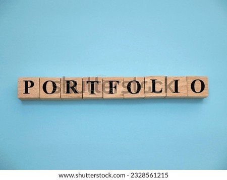 Portfolio, text words typography written with wooden letter, life and business motivational inspirational concept