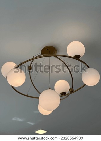 Decorate the house in a minimalist style with a ceiling lamp.