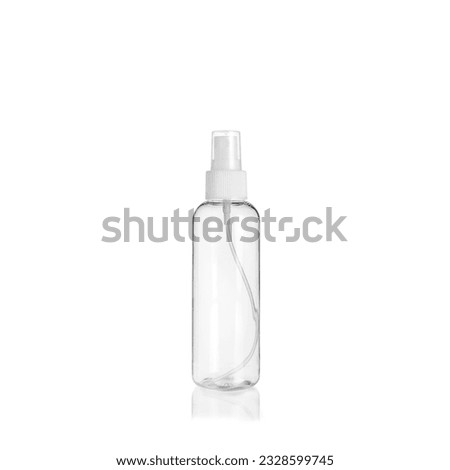 Transparent rounded cylindrical PET bottle container with spray pump on white background. Packaging of antiseptic. Template of a bottle for cosmetics and medical products. Royalty-Free Stock Photo #2328599745