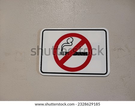 A sign forbidding smoking in public places