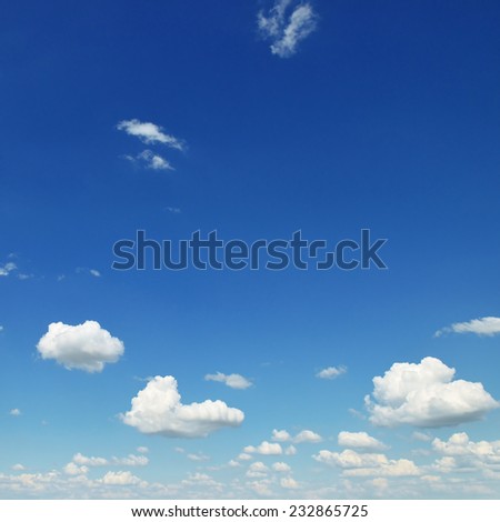 small white clouds on sky background