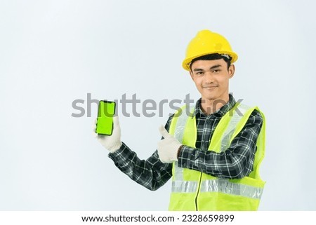 Hand drawn asian male service worker holding a green screen phone smiling confidently with his left hand He wore a brown and black striped shirt and light green coat, yellow hat and cotton gloves.