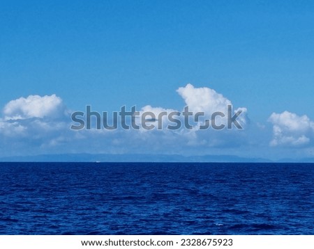 Possible UFO sighting on a boattrip to the Gili Islands Royalty-Free Stock Photo #2328675923