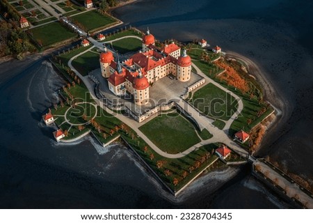 Saxony, Germany - Aerial view of the beautiful Moritzburg Castle (Schloss Moritzburg) on a sunny autumn day. Baroque palace in the German state of Saxony