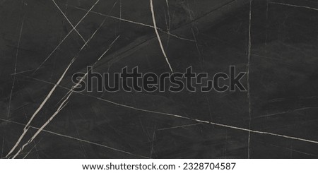black marble background. black Portoro marbl wallpaper and counter tops. black marble floor and wall tile. black travertino marble texture. natural granite stone. Royalty-Free Stock Photo #2328704587