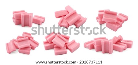 Set of tasty pink bubble gums on white background