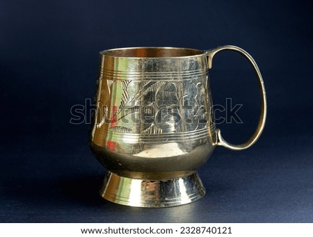 decorated, carved bronze mug for drinking water. popular pot in Bangladesh and indian royal family. food grade kansa glass or water pot. which helps enhancing the gut health.