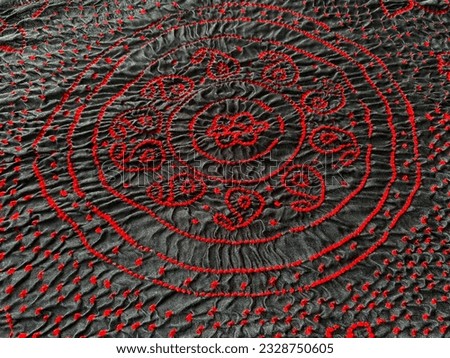 Black and red tie dye bandini in circular mandala geometric design