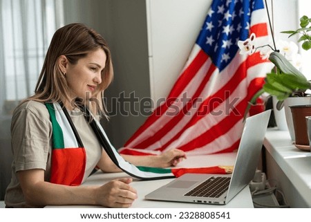 Student at desk studying free online American university academic course during global Covid 19 pandemic, writing essay, scholarship application, preparing for youth job, work travel, USA immigration