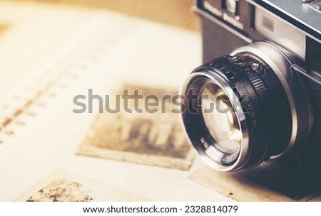 vintage camera on the background of old photos