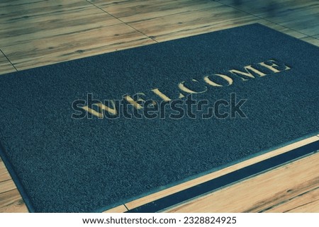 Big Welcome mat on floor decorations in modern home ,house concept. 