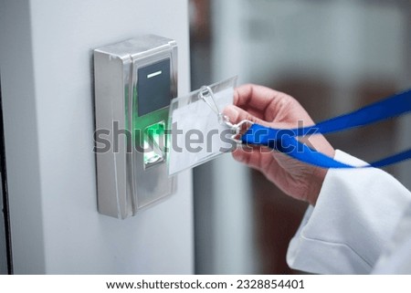 Hand, key card and fingerprint for security door, entrance or access control for safety in business, facility and property. Hands, electronic keys and laser scan, technology or secure laboratory lock Royalty-Free Stock Photo #2328854401