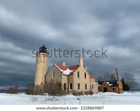 Winter wonderland lighthouse Lake Michigan 