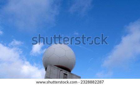 weather radar with sky in the background