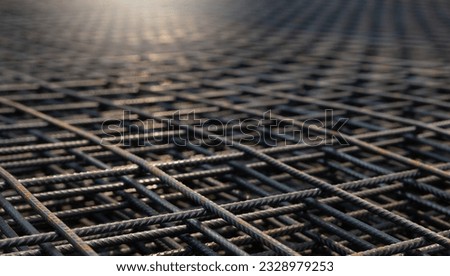 Steel Rebars for reinforced concrete. steel wire mesh for concrete slab reinforcement of construction. Background and banner Royalty-Free Stock Photo #2328979253