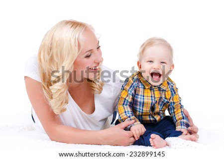 picture of happy mother with baby over white. Mother holding sweet baby boy. 